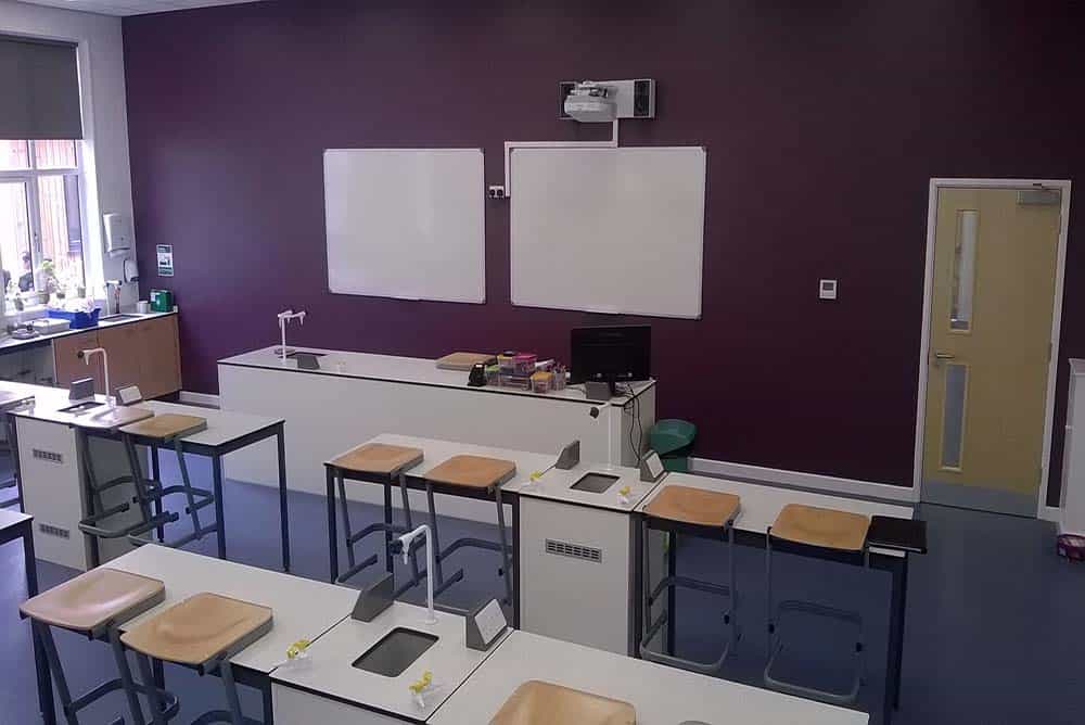 Adcote School for Girls science classroom purple contrast wall.