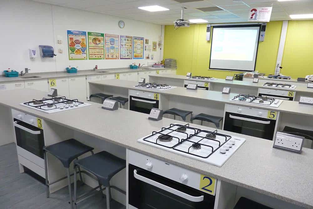 Prince Henry's Grammar School food tech classroom with yellow contrast wall.